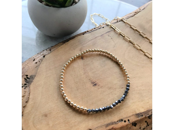 gold and black beaded bracelet