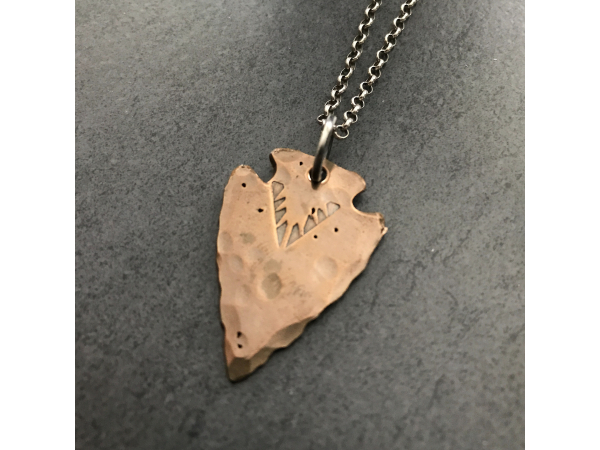 silver and bronze necklace