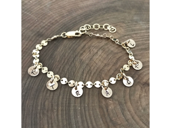 Custom gold charm bracelet