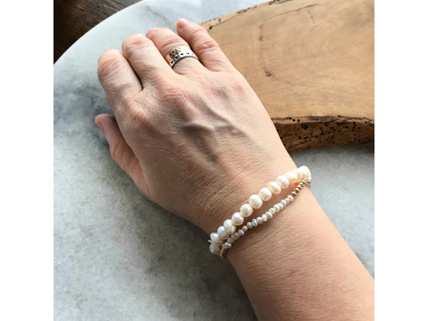 gold and pearl layering bracelet