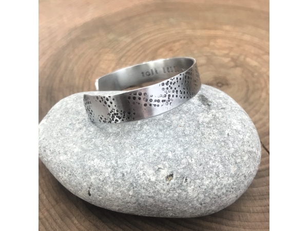 woman's custom message cuff