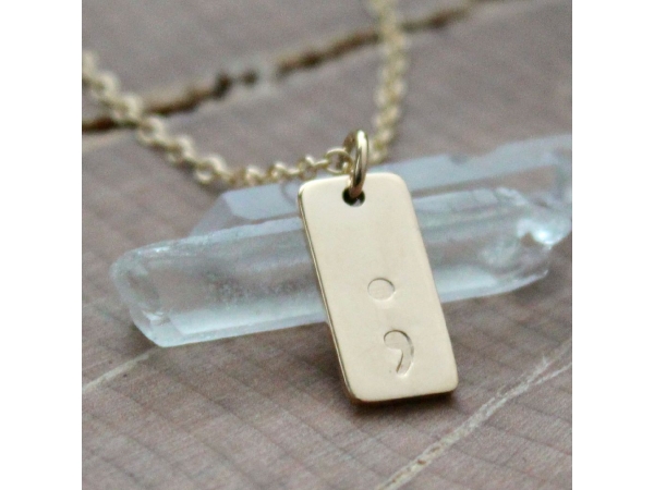 gold semi colon necklace