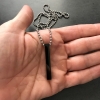 silver and black men's necklace