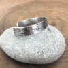 woman's custom message cuff