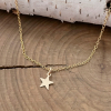 petite gold star necklace