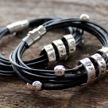 His and Hers Personalized Bracelets Hand Stamped With Custom Secret Spinner Mesage - Silver And Leather - Included in the 2012 GBK Emmy Awards Official Gift Lounge