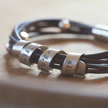 Personalized Silver and Leather Bracelet Hand Stamped With Custom Spinning Message to be included at the 2012 GBK Emmy Awards Official Gift Lounge